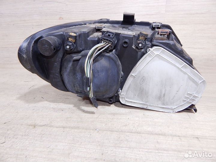 Фара левая Chrysler Voyager 4