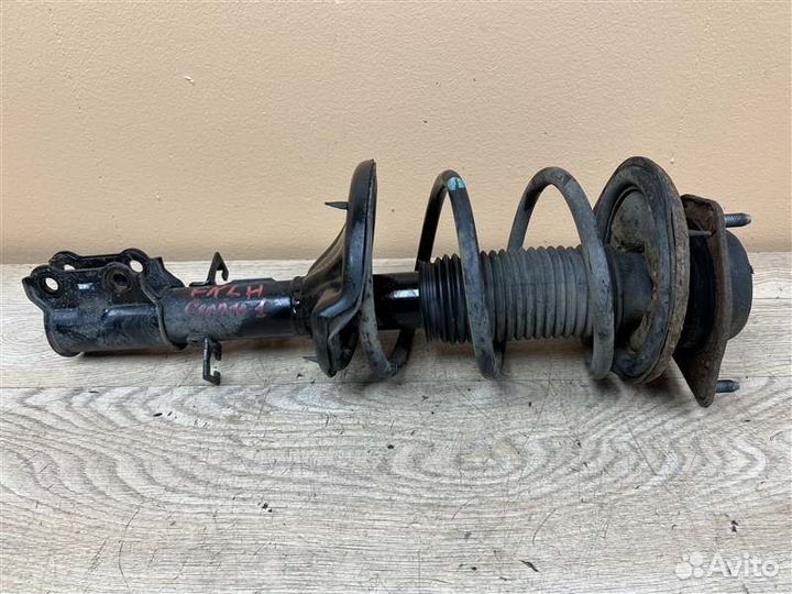 Амортизатор передний левый Kia Cerato 1 1.6 АКПП