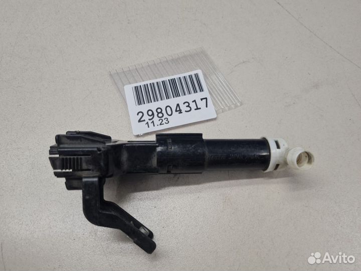 Форсунка омывателя фары левая Toyota Land Cruiser