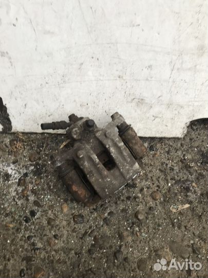 Суппорт тормозной задний правый Kia Sportage