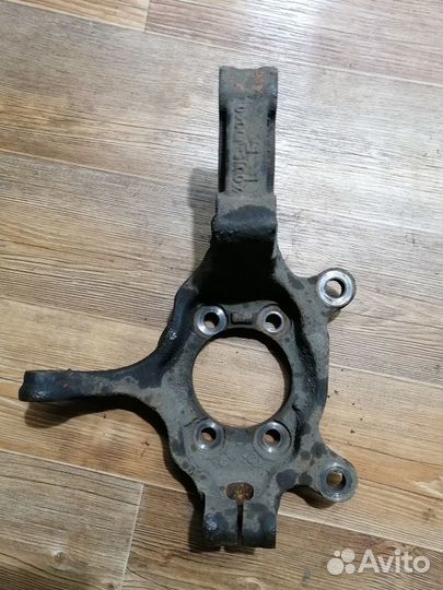 Кулак поворотный пер. лев. Кашкай J10, X-trail T31