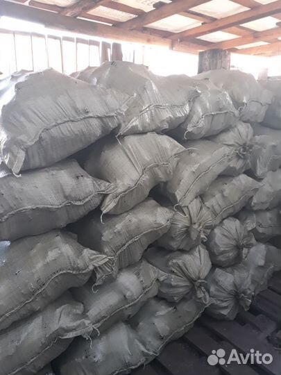 Уголь просеянный в мешках