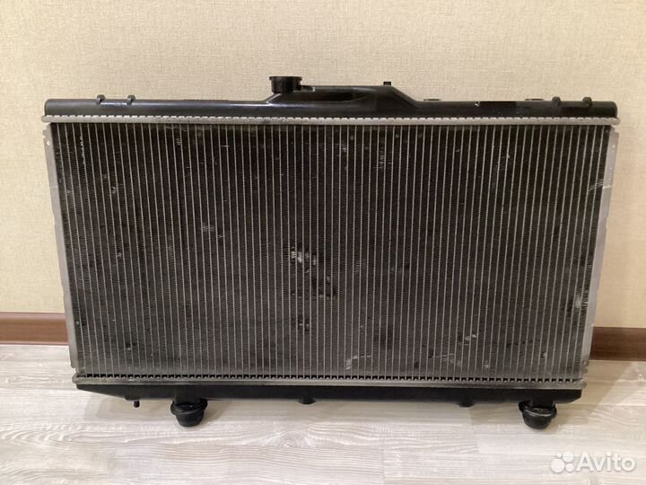 Радиатор охлаждения на Toyota Corolla Spacio AE111