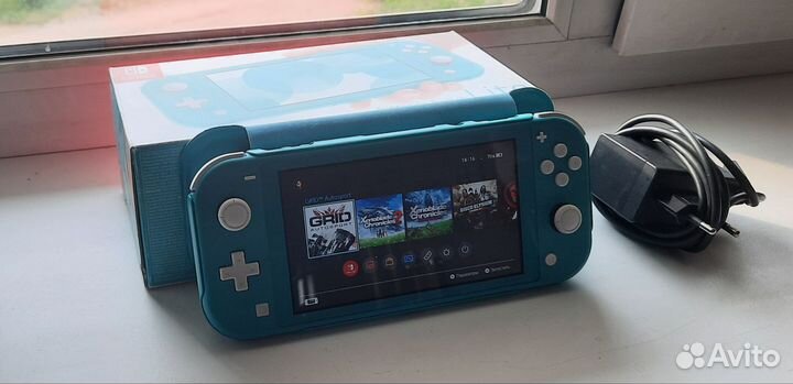 Nintendo switch lite (прошитая с чехлом книжкой)