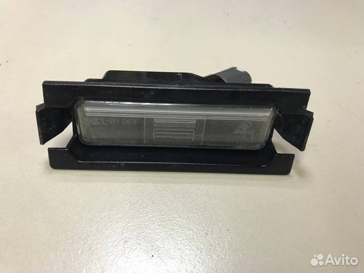 Фонарь подсветки номера Левый Kia Rio