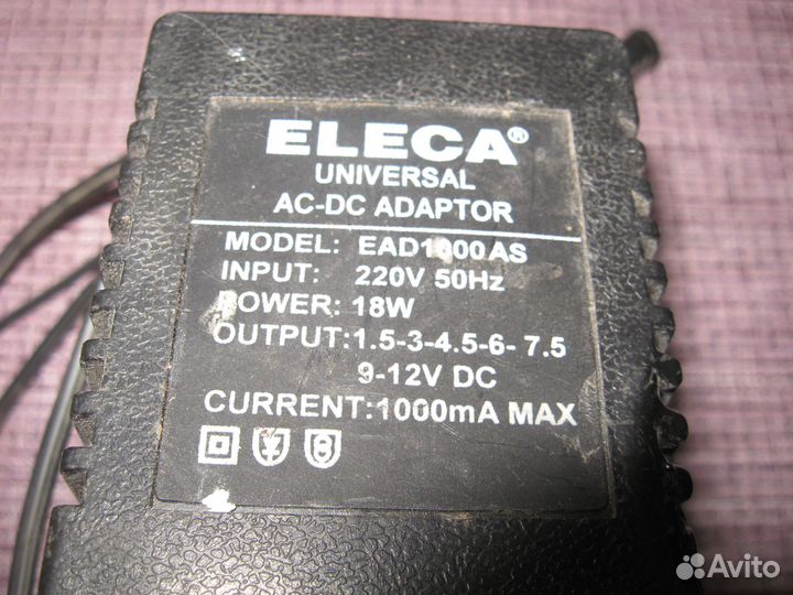Блок питания eleka universal AC-DC adaptor 1,5-12V