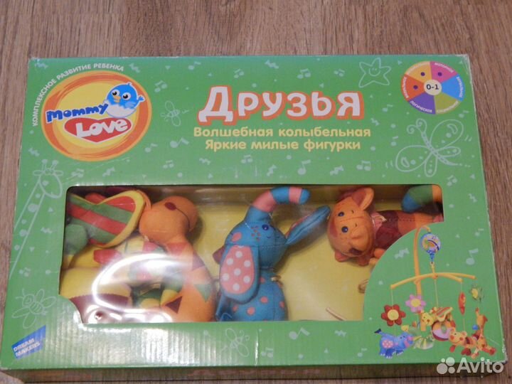 Мобиль в кроватку новый