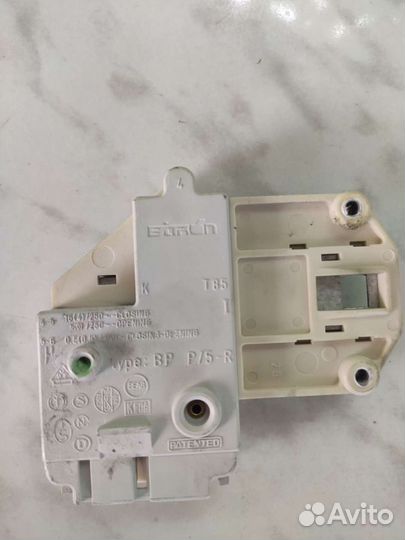 Замок люка на стиральную машину Zanussi