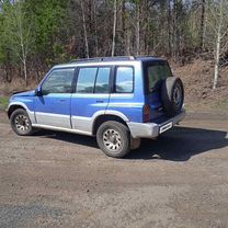 Suzuki Escudo 1.6 AT, 1997, 429 031 км, с пробегом, цена 480 000 руб.