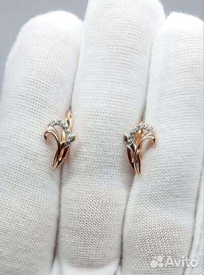 Золотые серьги с камнем