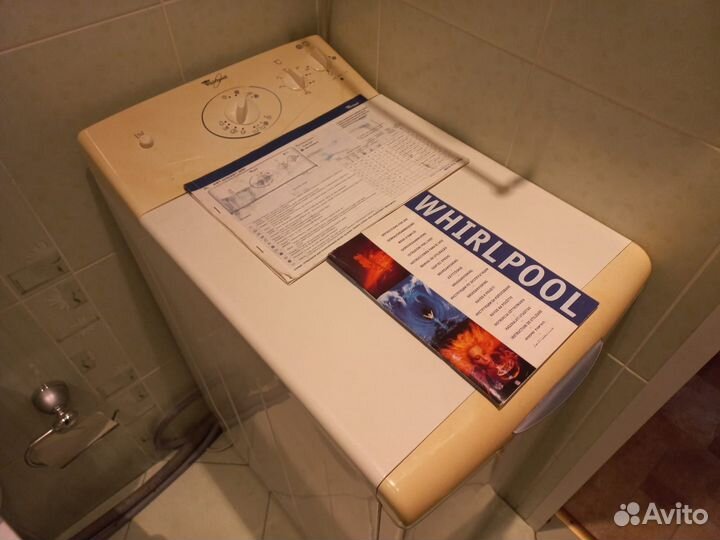 Стиральная машина с вертикальной загрузкой