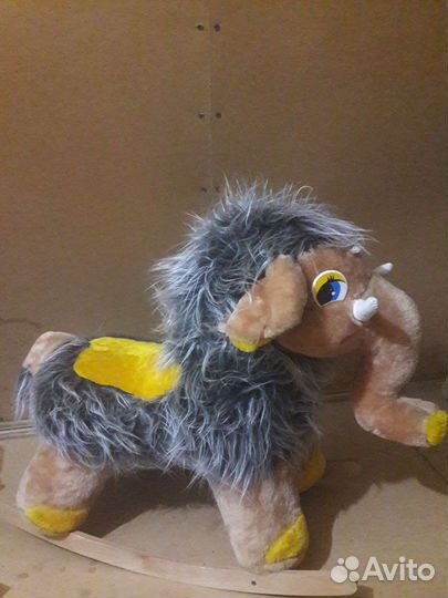 Детская игрушка качалка