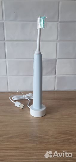 Электрическая зубная щетка philips
