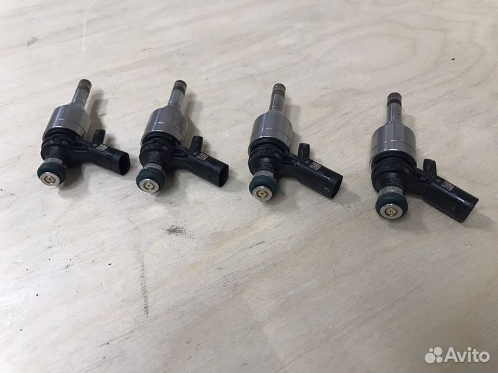 Топливная форсунка 06L906036J Passat B8