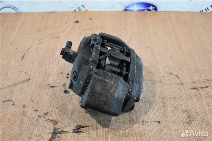 Суппорт тормозной передний левый Mercedes-Benz Ml