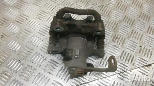 Суппорт тормозной задний левый peugeot 3008 (ZKR04