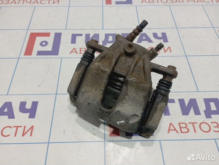 Суппорт тормозной передний левый Nissan Almera (G15) 41011-00Q0F