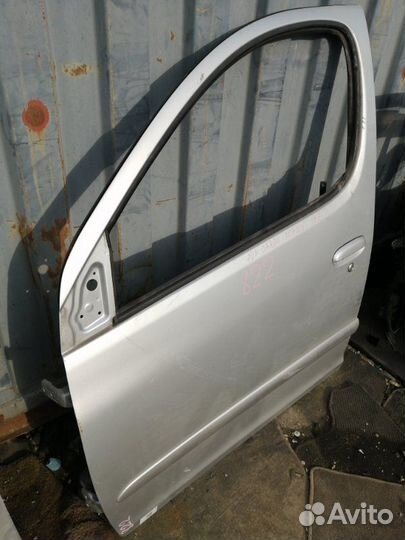 Дверь передняя левая Toyota Funcargo NCP20