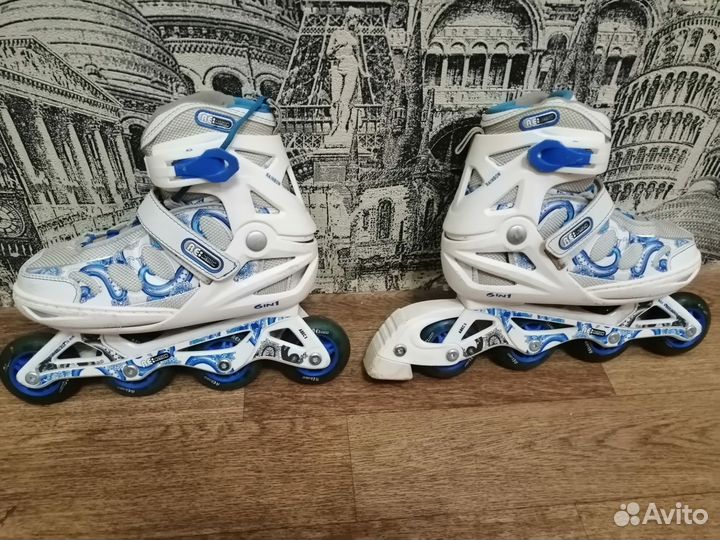 Роликовые коньки