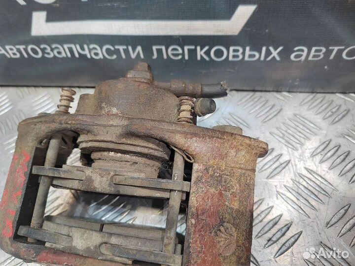 Суппорт тормозной передний левый Daewoo Nexia