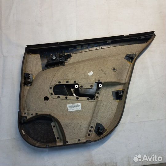 Обшивка двери задняя левая Opel Astra H