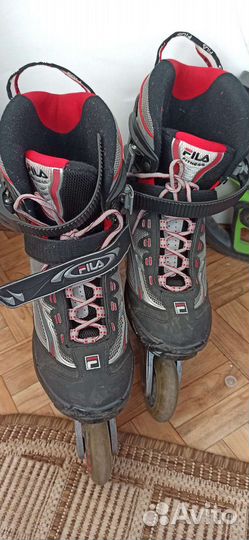 Роликовые коньки