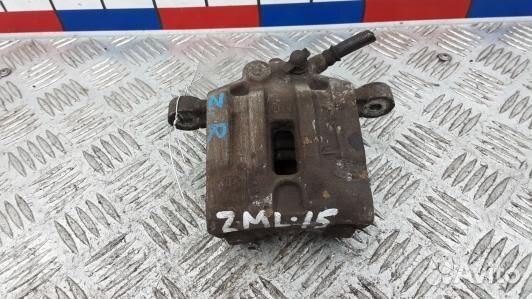 Суппорт тормозной задний правый KIA carens 3 (ZML1