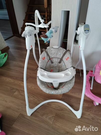 Детские электронные качели graco