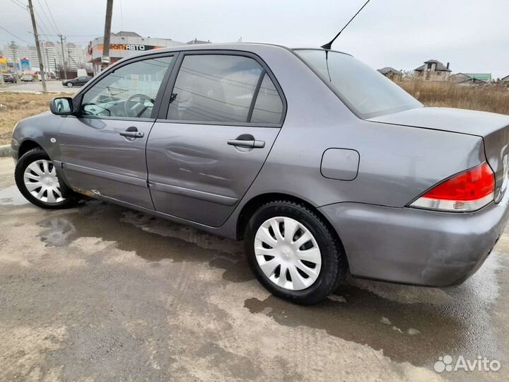 Mitsubishi Lancer 1.6 МТ, 2005, 230 000 км