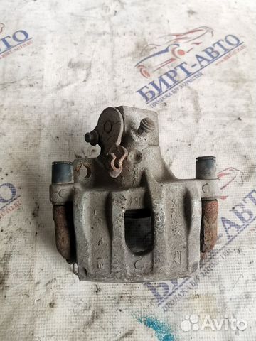 Суппорт тормозной задний левый Ford Focus II реста