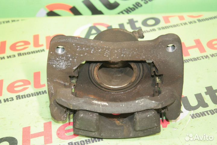 Суппорт toyota corolla NZE121N 1NZ-FE перед право