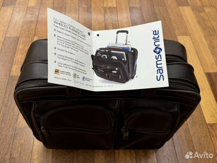 Дорожная кожанная сумка Samsonite