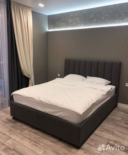 Кровать с мягким изголовьем