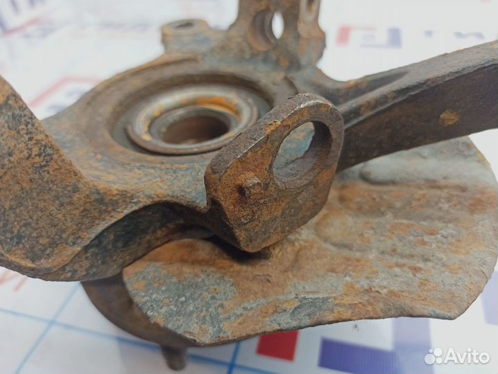 Кулак поворотный передний левый Chevrolet Lacetti