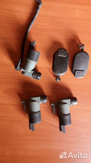 Моторчик омывателя от Рено логан сандеро