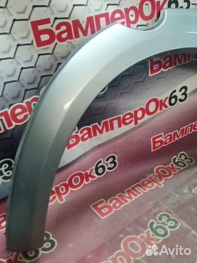 Накладка крыла Mitsubishi L200 задняя левая