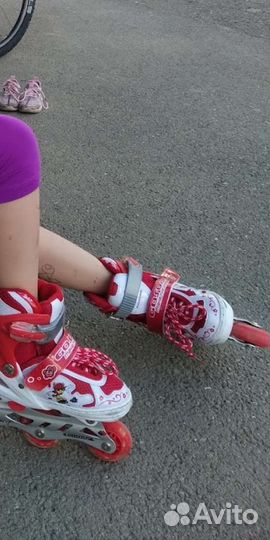 Роликовые коньки