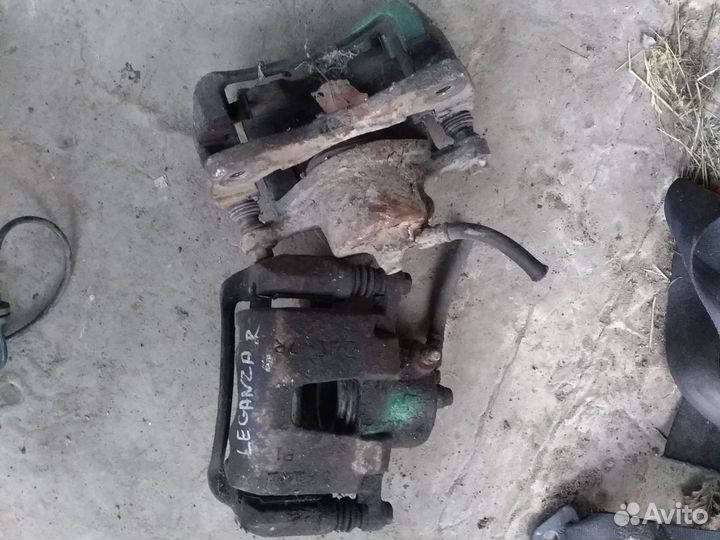 Суппорт Дэу Леганза левый передний