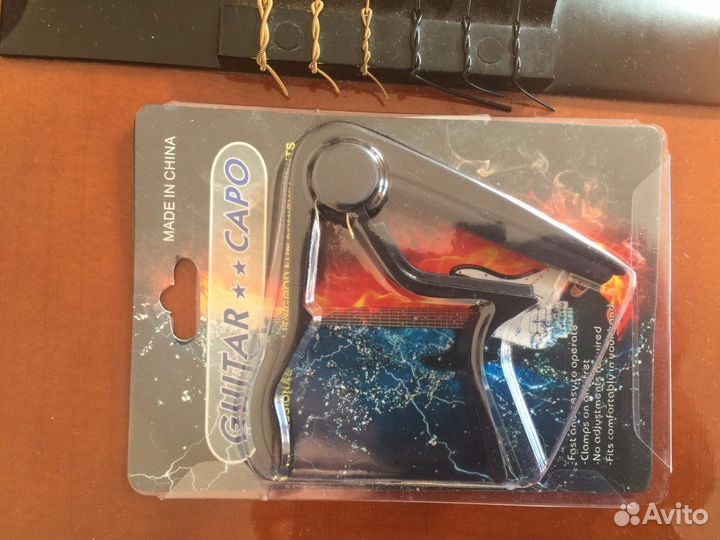 Каподастр для гитары