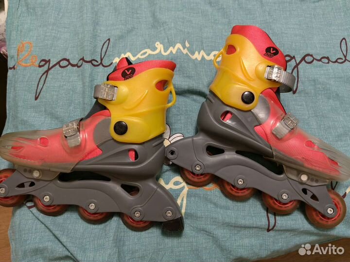 Роликовые коньки