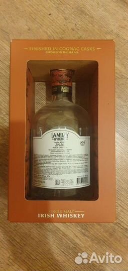 Пустая бутылка от виски в коробке