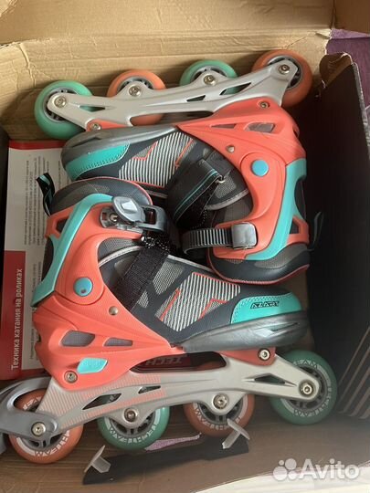 Роликовые коньки