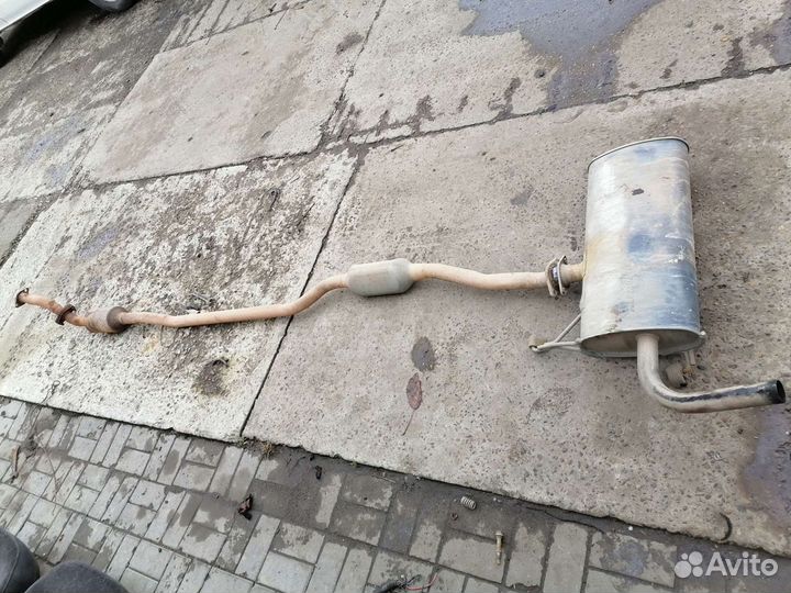 Выхлопная труба митсубиси ланцер 10 2008г с катом