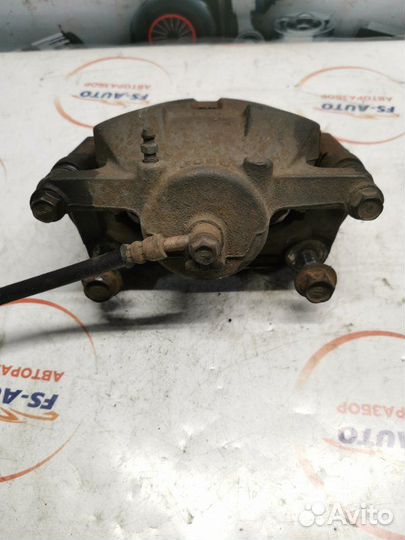 Суппорт тормозной передний левый Nissan Qashqai