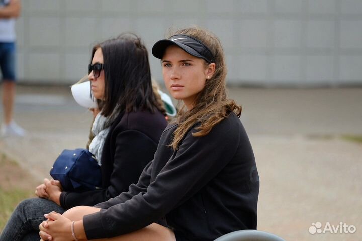 Тренер по большому теннису