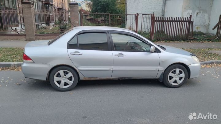 Mitsubishi Lancer 1.6 МТ, 2005, 307 220 км