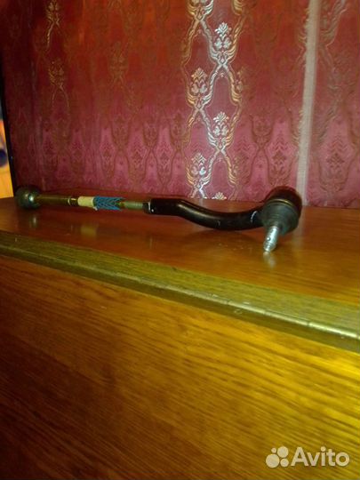 Рулевая тяга с рулевым наконечником левый