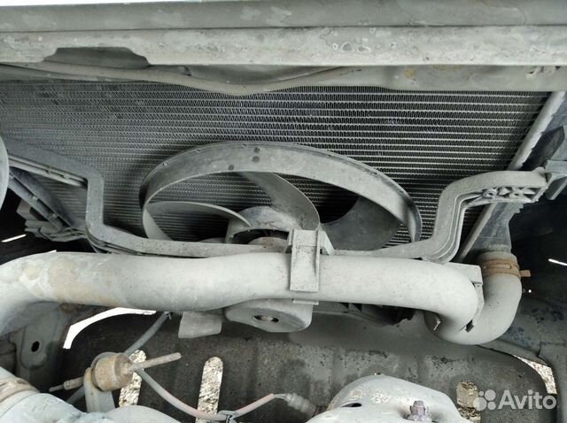 Радиатор охлаждения с вентилятором Рено Логан