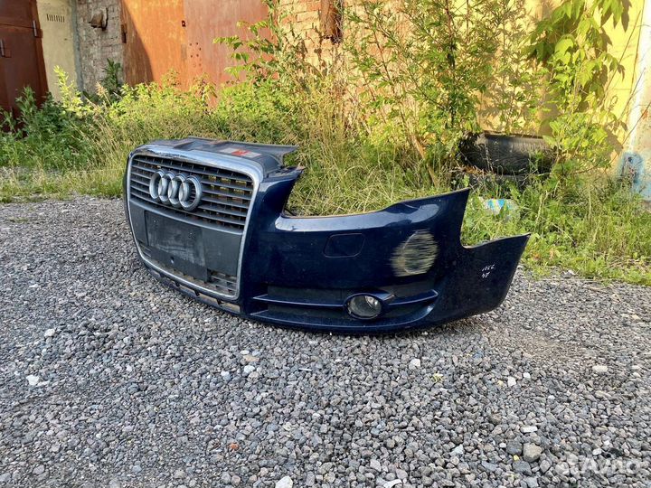 Передний бампер с решеткой на audi a4 b7