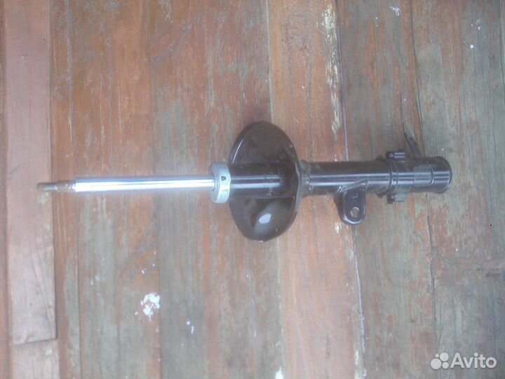 Стойка амортизатора Hyundai-Kia mando левая